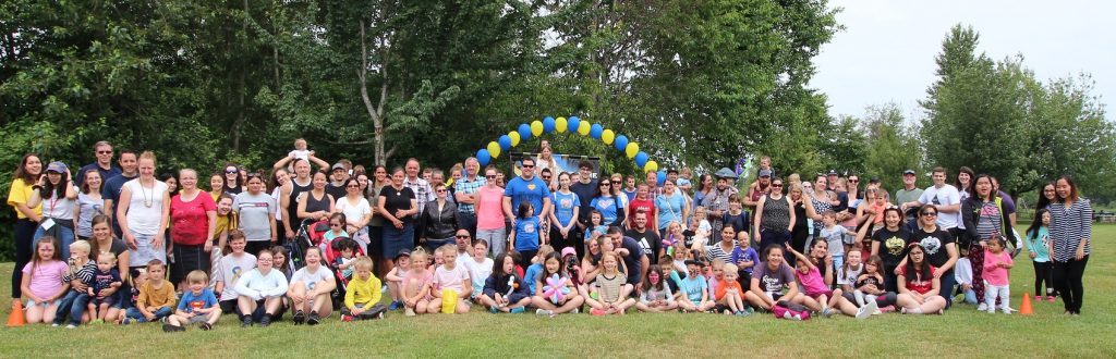 Families gather to show support people with Down syndrome.