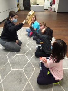 Children with Down syndrome taking part in Music Therapy